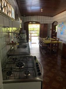 Kuchyň nebo kuchyňský kout v ubytování Hostel Roraima