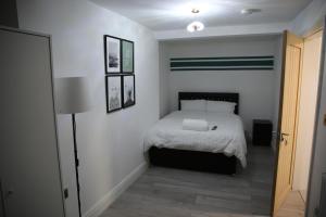 Postel nebo postele na pokoji v ubytování Rostron House