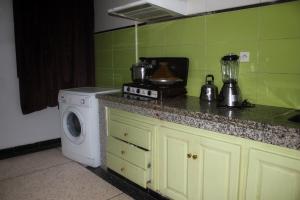Kuchyň nebo kuchyňský kout v ubytování Appartement Afgo Ouarzazate