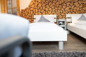 Postel nebo postele na pokoji v ubytování Sonnenhang