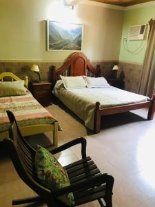 A bed or beds in a room at Finca Victoria