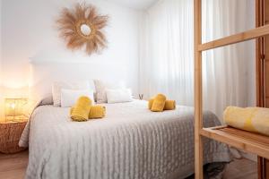 Posteľ alebo postele v izbe v ubytovaní Apartmento Nobu