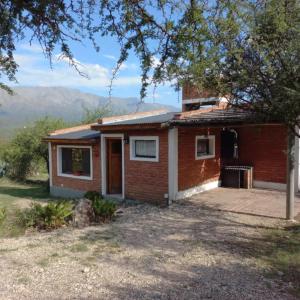 a home with a view of the mountains at cabañas fátima in Villa de Las Rosas
