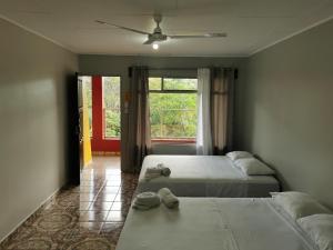 Postel nebo postele na pokoji v ubytování Hotel Puerto San Luis + 37 fotografií