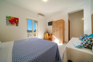 Ένα ή περισσότερα κρεβάτια σε δωμάτιο στο Hotel Damanse