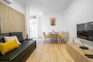 Televízia a/alebo spoločenská miestnosť v ubytovaní Self check-in! Apartment in the heart of Málaga!