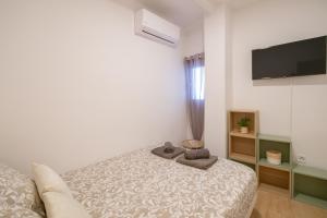 Posteľ alebo postele v izbe v ubytovaní Self check-in! Apartment in the heart of Málaga!