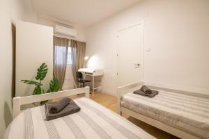Posteľ alebo postele v izbe v ubytovaní Self check-in! Apartment in the heart of Málaga!