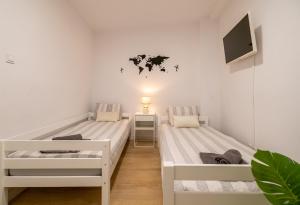 Posteľ alebo postele v izbe v ubytovaní Self check-in! Apartment in the heart of Málaga!