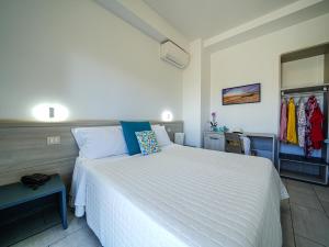 Ένα ή περισσότερα κρεβάτια σε δωμάτιο στο Hotel Damanse