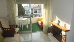 Posezení v ubytování Dúplex La Perla de Andalucia + 37 fotografií