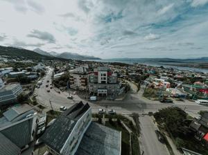 an aerial view of a city with a street at Mystic Mountains - Bienvenido/Welcome. Check in & Chill in Ushuaia