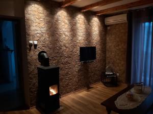 TV a/nebo společenská místnost v ubytování Apartman Gara
