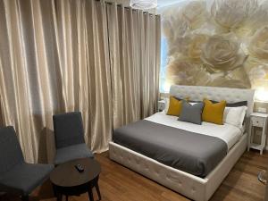 Postel nebo postele na pokoji v ubytování Rigoletto Rental Rooms