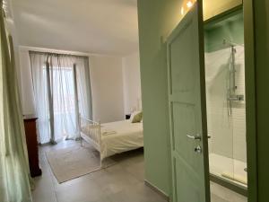 Postel nebo postele na pokoji v ubytování Il B&B dei viaggiatori + 36 fotografií
