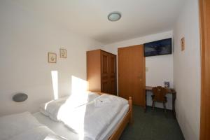 Postel nebo postele na pokoji v ubytování Haus Arnold by Châtel Reizen