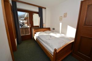 Postel nebo postele na pokoji v ubytování Haus Arnold by Châtel Reizen