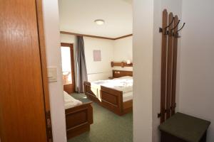 Postel nebo postele na pokoji v ubytování Haus Arnold by Châtel Reizen