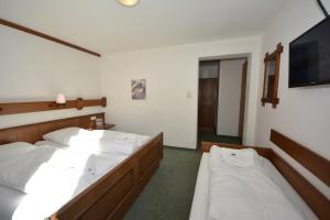 Postel nebo postele na pokoji v ubytování Haus Arnold by Châtel Reizen