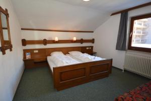 Postel nebo postele na pokoji v ubytování Haus Arnold by Châtel Reizen