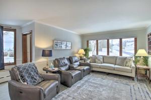 a living room with two couches and a couch at Two Rivers Thiede House - Walk to Lake Michigan! in Two Rivers