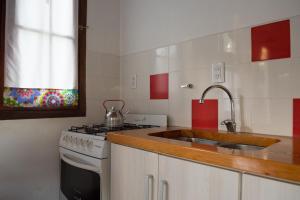 Kuchyň nebo kuchyňský kout v ubytování Casa Isabela