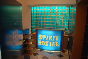 a sign that says spirit hostel in a bathroom at Spirit Hostel and Apartments in Belgrade