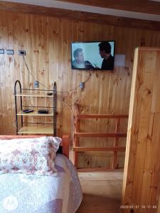 Voodi või voodid majutusasutuse CABAÑAS QUELLON toas