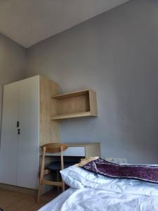 Una cama o camas en una habitación de Mahkota Valley Suite Apartment Indera Mahkota Kuantan