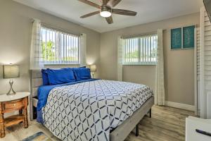 a bedroom with a bed and a ceiling fan at Gated Southern Miami Home 22 Mi to Downtown! in Miami