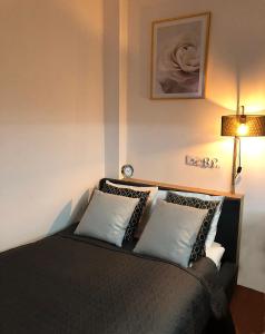 Katil atau katil-katil dalam bilik di Apartimento Hydral Lusso