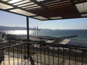 a view of the ocean from a balcony at Casa Hostal Vista al Mar in Valparaíso