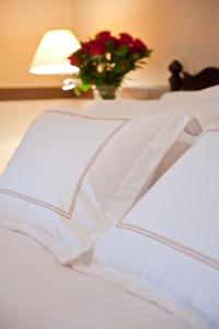 Posteľ alebo postele v izbe v ubytovaní Hotel Dann Monasterio