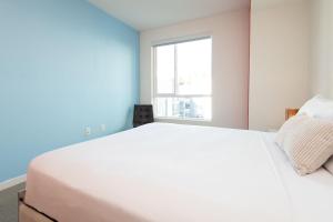 Modern Apartment Rentals客房内的一张或多张床位