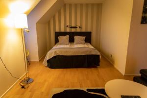 Hotel Carlshamn 객실 침대