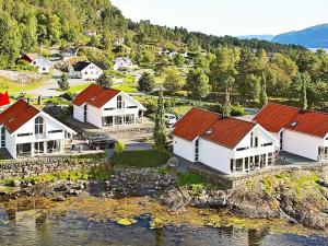 an aerial view of a house on the water at Five-Bedroom Holiday home in Jelsa 3 in Jelsa