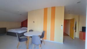 Posedenie v ubytovaní Colors Holiday Hotel