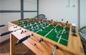 a large table with a soccer game on it at Gorgeous Home In Novo Zvecevo With Wifi in Novo Zvecevo