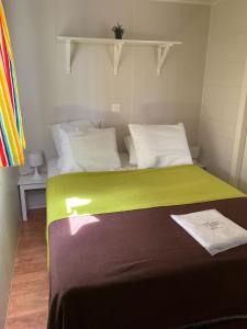 Postel nebo postele na pokoji v ubytování Mobilhome ECHO des VAGUES