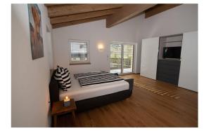 Postel nebo postele na pokoji v ubytování Ferienhaus Reiter Jochberg bei Kitzbühel