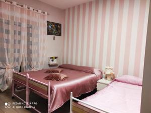 A bed or beds in a room at A&C SweetHome