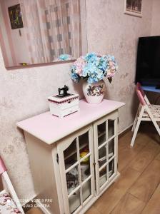A television and/or entertainment centre at A&C SweetHome