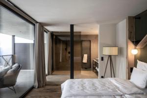 A bed or beds in a room at Aparthotel My Daum