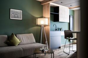 A seating area at Aparthotel My Daum