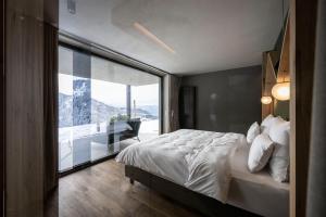 A bed or beds in a room at Aparthotel My Daum