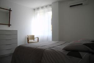 Posteľ alebo postele v izbe v ubytovaní Appart dans maison 2 km de la plage