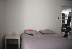 Posteľ alebo postele v izbe v ubytovaní Appart dans maison 2 km de la plage