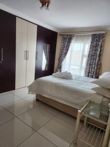 En eller flere senge i et værelse på 70 on Aviva Bed and Go + 11 billeder