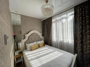 Postel nebo postele na pokoji v ubytování Rikhe palace boutique hotel