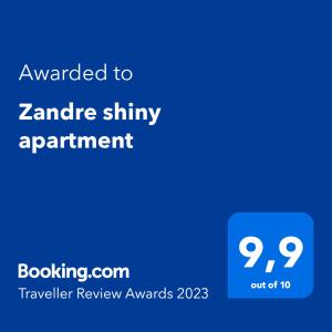 a blue screen with the text awarded to zander shiny apartment at Zandre shiny apartment in Nea Potidaea